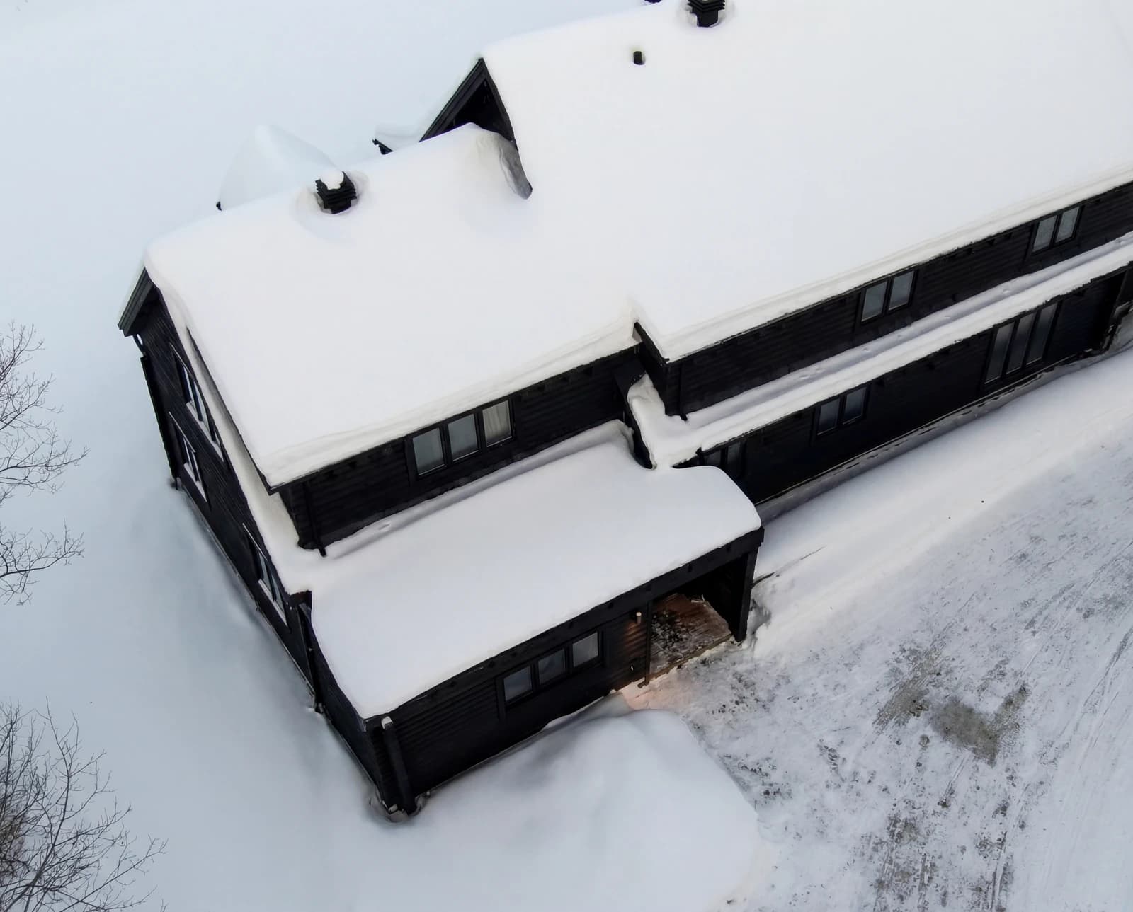 Cabin aerial view in deep snow
