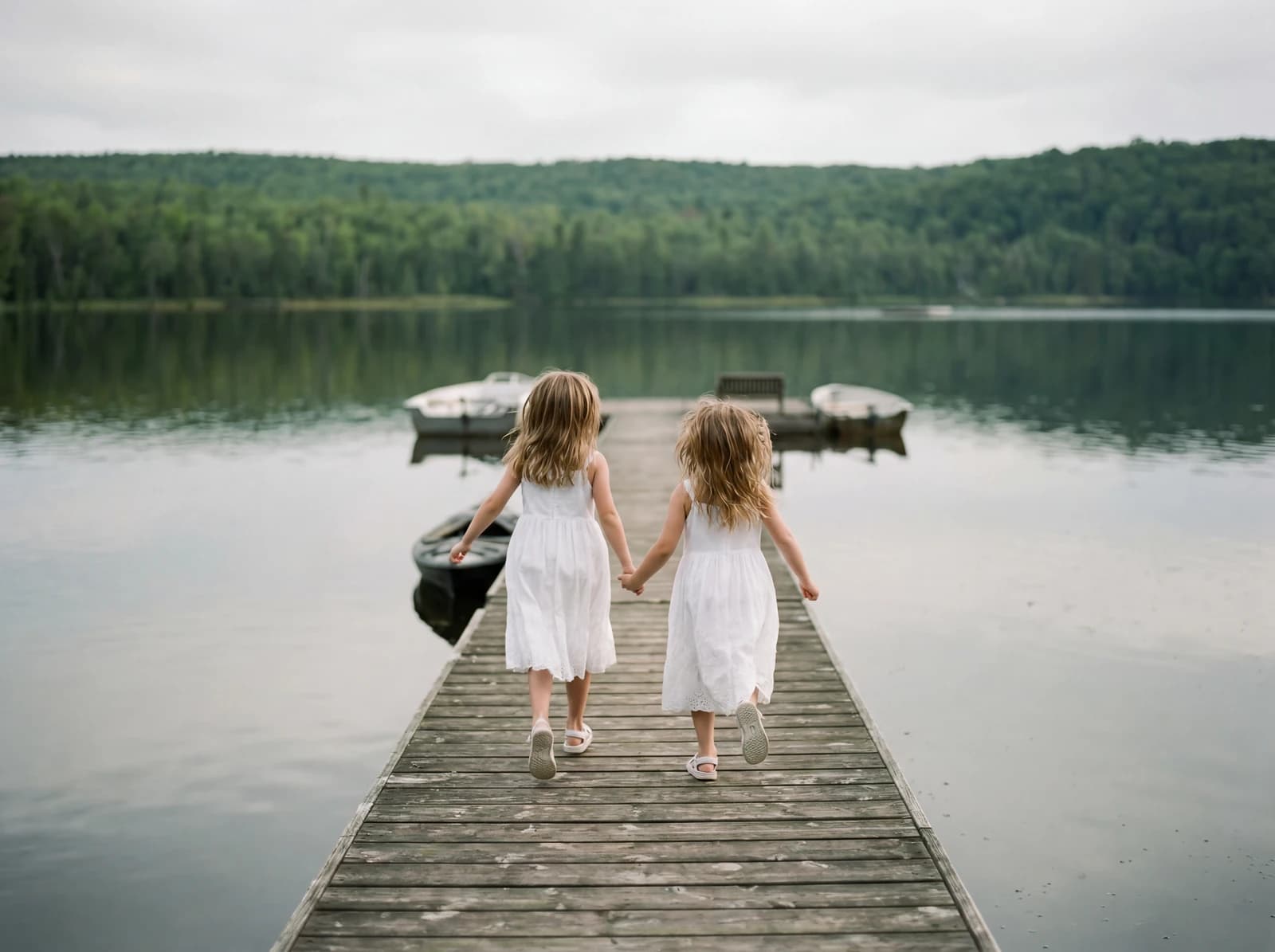Girls walking by the lake