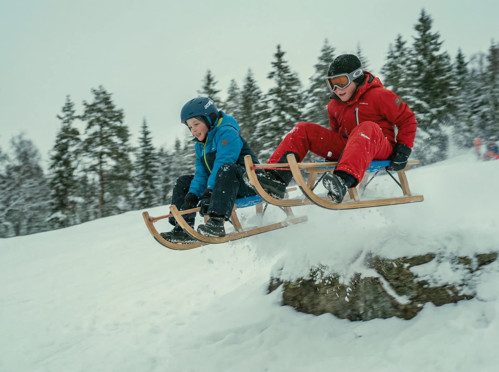 Kids sledding in the snow