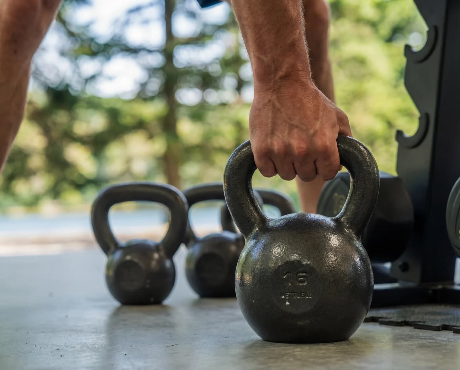 Kettlebells and dumbbells at the outdoor gym